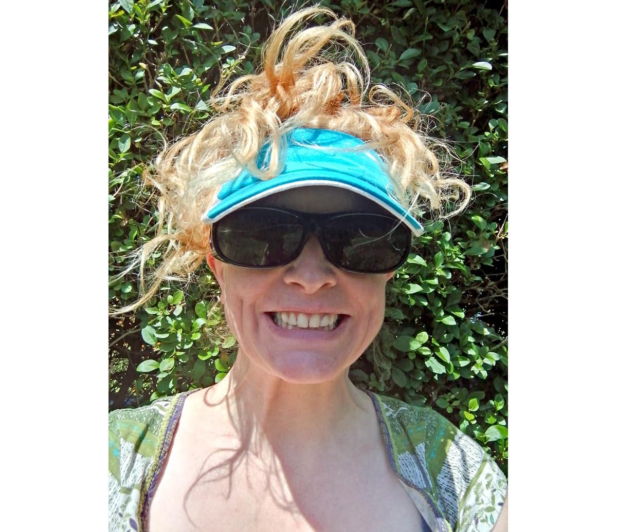 Outside with my polarised sunglasses and peak