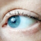 Photo showing my eye with tears that are pooling on my contact lens